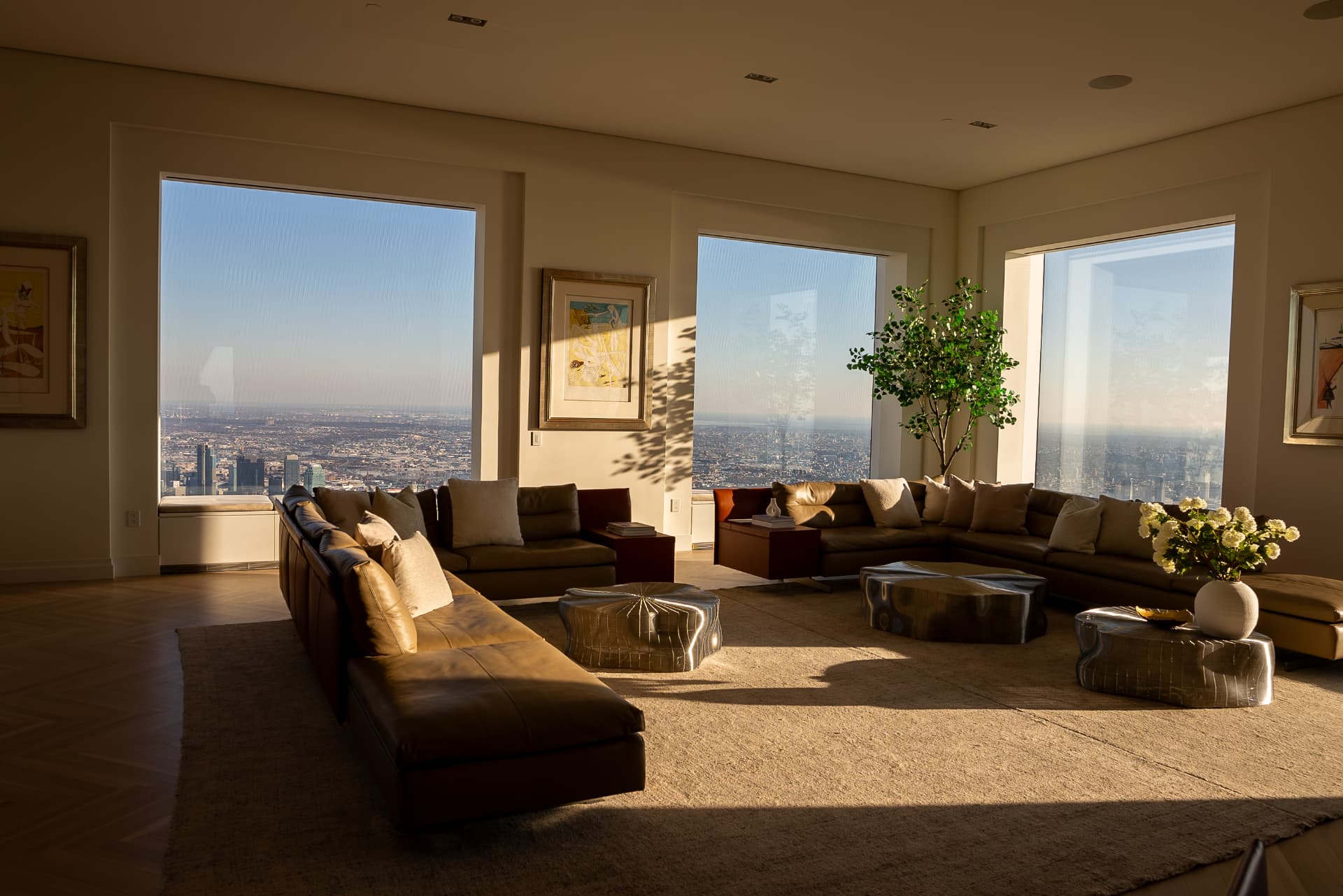 Luxury high-rise interior with leather sectionals