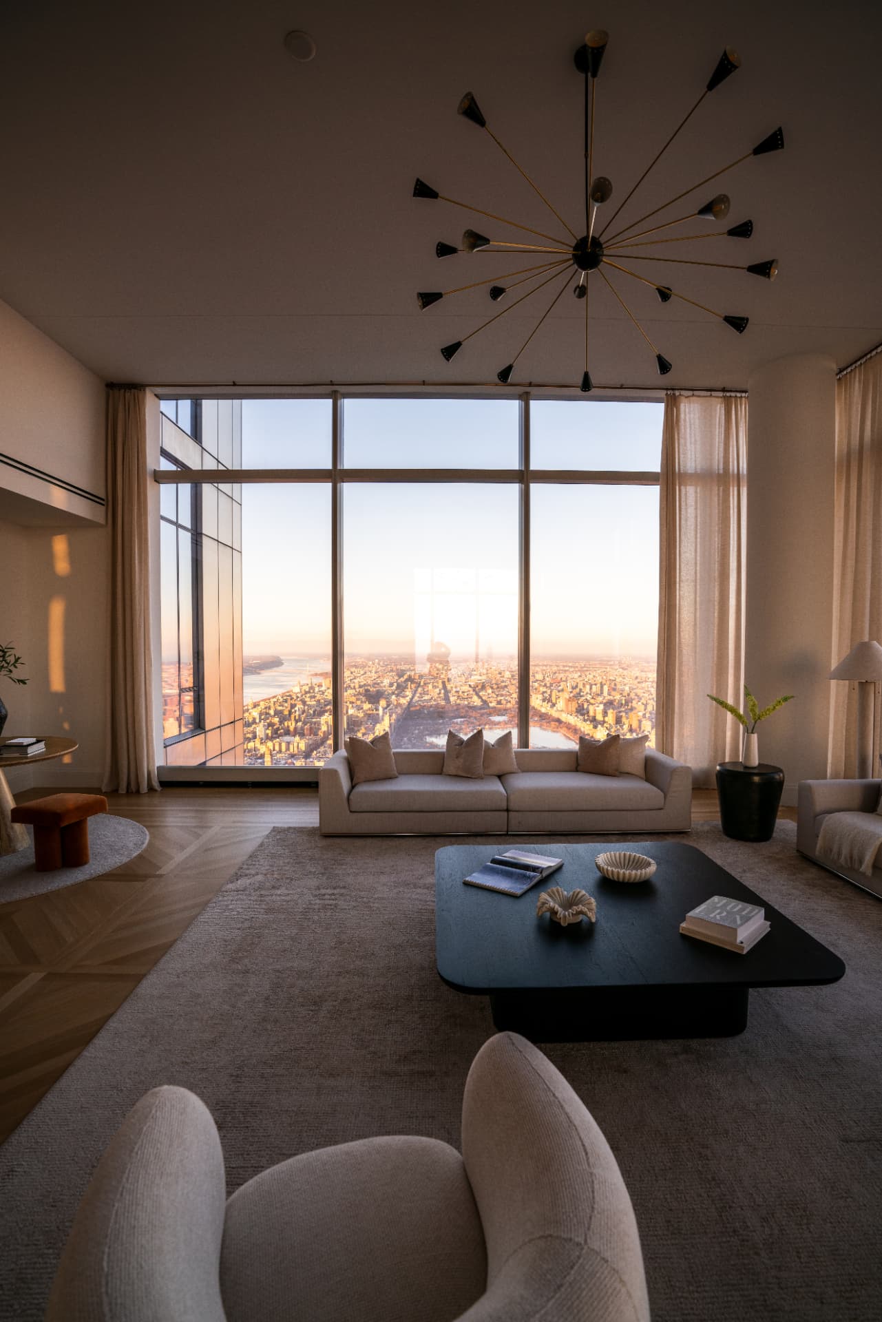Living room overlooking Central Park at golden hour